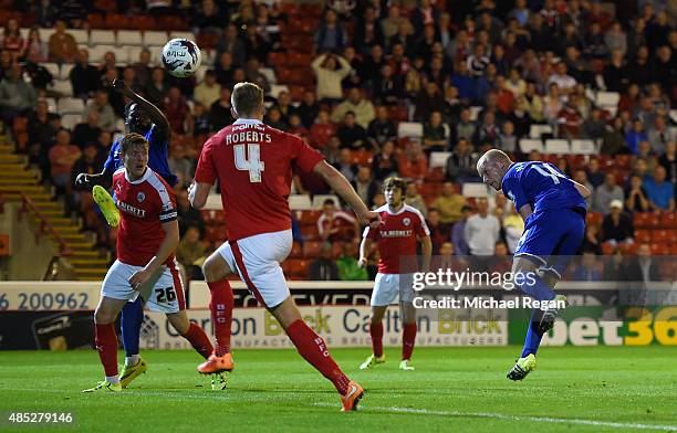 Steven Naismith of Everton scores with a header during the Capital One Cup second round match between Barnsley and Everton at Oakwell Stadium on...