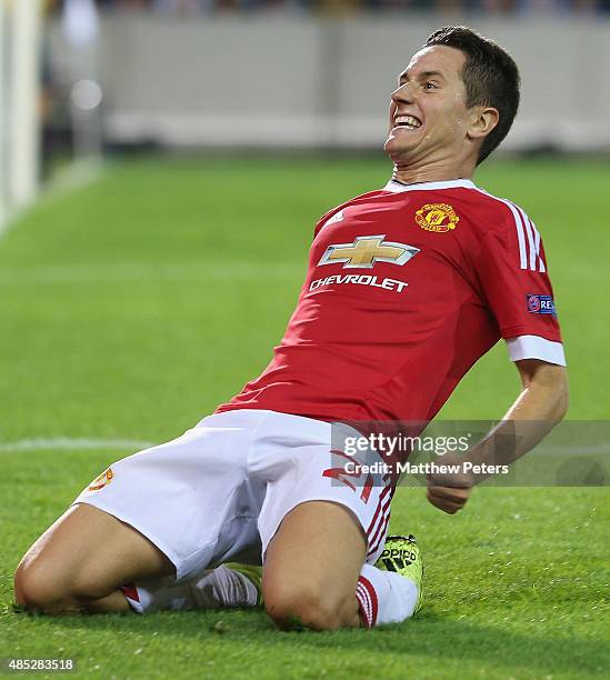 Ander Herrera of Manchester United celebrates scoring their fourth goal during the UEFA Champions League play-off second leg match between Club...