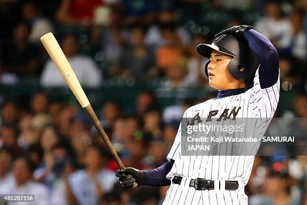 Kotaro Kiyomiya of Japan bats in the bottom half of the third inning in the send-off game between U-18 Japan and Collegiate Japan before the 2015...