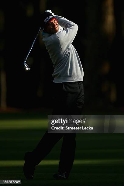 Bill Haas plays a shot on the 11th fareway during the first round of the RBC Heritage at Harbour Town Golf Links on April 17, 2014 in Hilton Head...