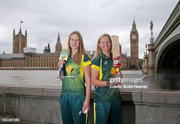 Elyse Perry and Meg Lanning of the Australian Women's cricket team pose in front of Big Ben on August 3, 2015 in London, England.