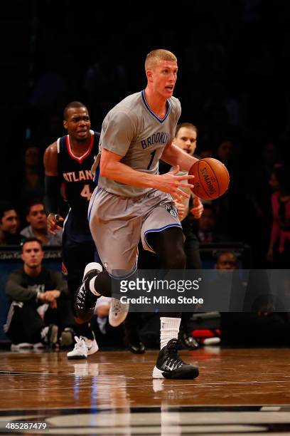 Mason Plumlee of the Brooklyn Nets in action against the Atlanta Hawks at Barclays Center on April 11, 2014 in New York City. NOTE TO USER: User...