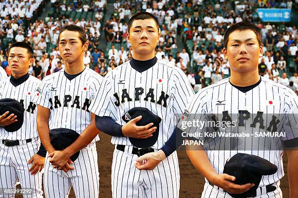 Dh Kotaro Kiyomiya of Japan lines up for national anthem in the send-off game between U-18 Japan and Collegiate Japan before the 2015 WBSC U-18...