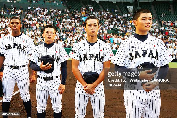 InfielderTaiga Hirasawa of U-18 Japan lines up for national anthem in the send-off game between U-18 Japan and Collegiate Japan before the 2015 WBSC...