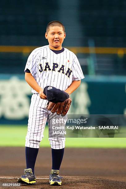Tokiharu Nishioka of U-12 of Japan first-pitchs ceremony opening pitch ceremony in the send-off game between U-18 Japan and Collegiate Japan before...