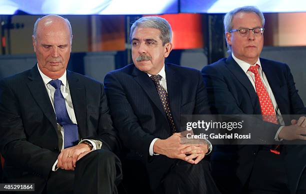 Chief of Cabinet, Anibal Fernandez looks on during a ceremony commemorating the 161st anniversary of the Buenos Aires Stock Exchange on August 26,...