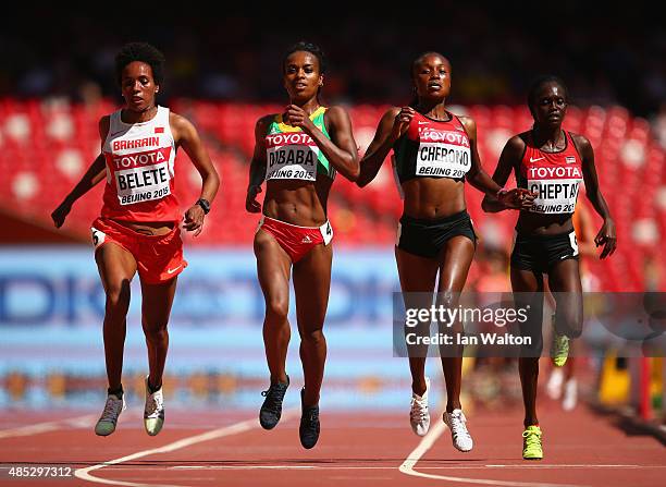 Mimi Belete of Bahrain, Genzebe Dibaba of Ethiopia, Mercy Cherono of Kenya and Irene Chepet Cheptai of Kenya compete in the Women's 5000 metres heats...