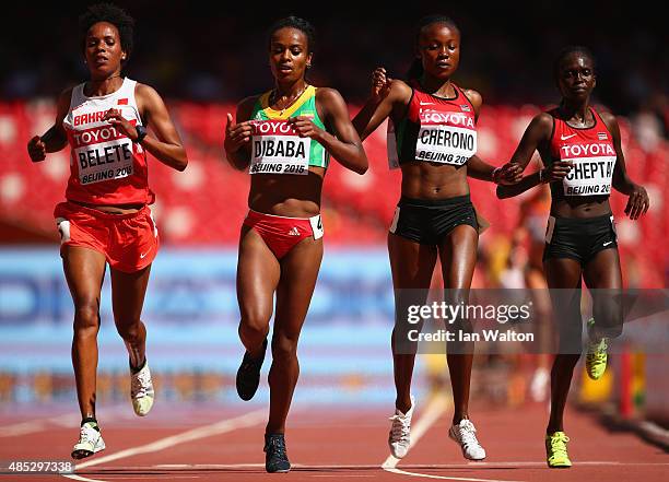 Mimi Belete of Bahrain, Genzebe Dibaba of Ethiopia, Mercy Cherono of Kenya and Irene Chepet Cheptai of Kenya compete in the Women's 5000 metres heats...