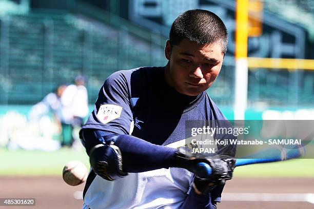 Kotaro Kiyomiya of Japan in acton during in the send-off game between U-18 Japan and Collegiate Japan before the 2015 WBSC U-18 Baseball World Cup at...