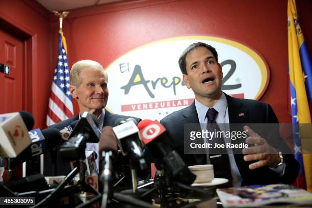 Senators Bill Nelson and Marco Rubio hold a press conference to show support for the Venezuelan community at the El Arepazo 2 Restaurant on April 17,...