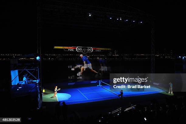 Monica Puig and John Isner play tennis at Rally On The River presented by American Express, featuring Maria Sharapova, John Isner, Monica Puig and DJ...