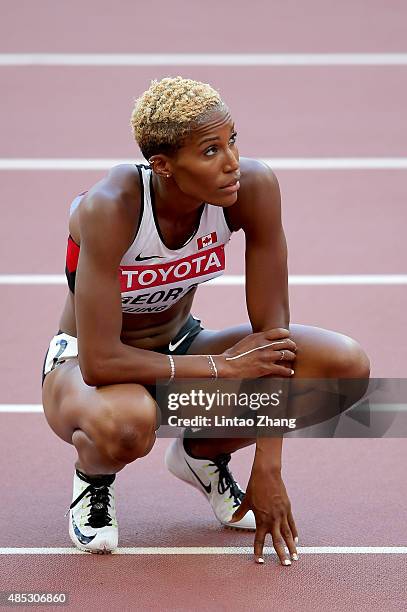 Phylicia George of Canada reacts after competing in the Women's 100 metres hurdles heats during day six of the 15th IAAF World Athletics...