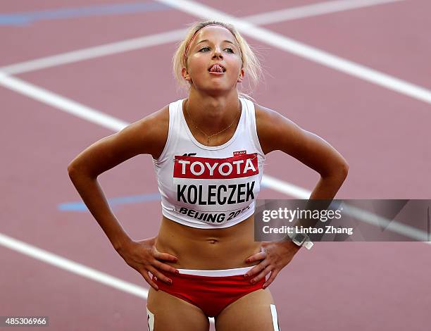 Karolina Koleczek of Poland reacts after competing in the Women's 100 metres hurdles heats during day six of the 15th IAAF World Athletics...