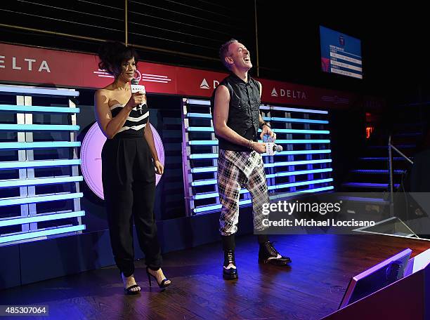 Rosie Perez and Alan Cumming perform at the 2nd Annual Delta OPEN Mic With Serena Williams at Arena on August 26, 2015 in New York City.