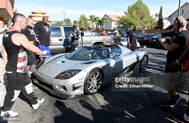 Boxer Floyd Mayweather Jr. Arrives at the Mayweather Boxing Club in his new USD 4.8 million Koenigsegg CCXR Trevita car for a media workout on August...