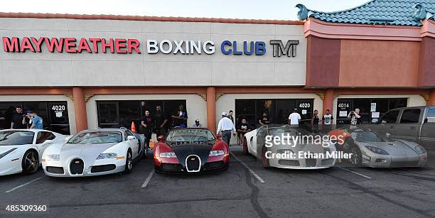 Boxer Floyd Mayweather Jr.'s three Bugattis and his new USD 4.8 million Koenigsegg CCXR Trevita car are parked outside the Mayweather Boxing Club...