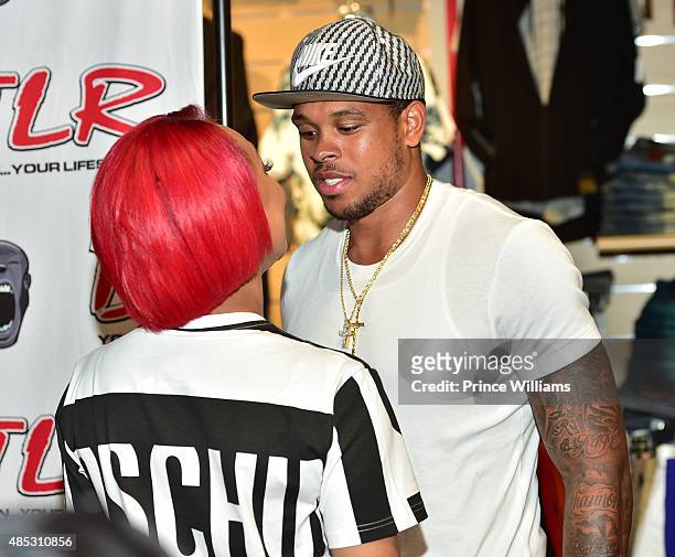 Monica Brown and Shannon Brown attend Monica's meet and greet showcasing her single "Just Right for Me" at DTLR at Cramp Creek on August 26, 2015 in...