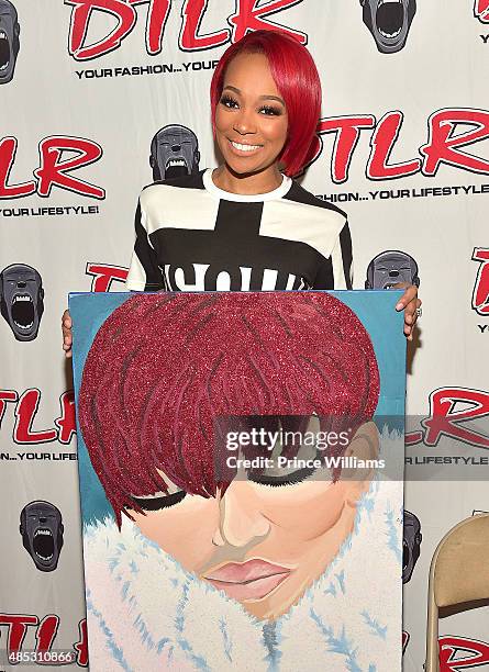 Singer Monica Brown greets fans at her meet and greet showcasing her single "Just Right for Me" at DTLR at Cramp Creek on August 26, 2015 in Atlanta,...