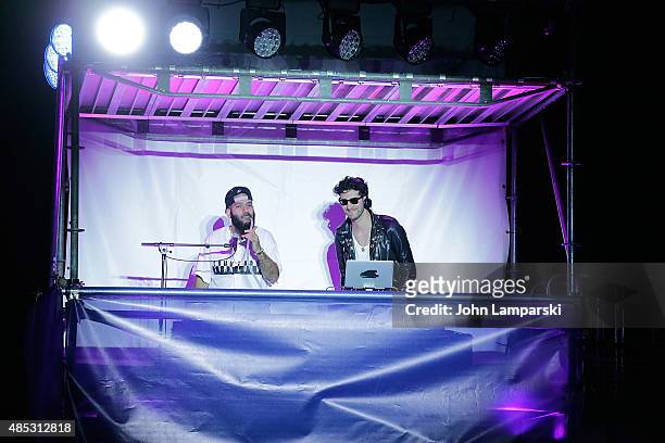 Chromeo's Patrick Genayel and David Macklovich attend the 2015 American Express Rally On the River at Pier 97 on August 26, 2015 in New York City.
