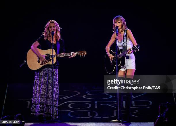 Actress Lisa Kudrow and singer-songwriter Taylor Swift perform onstage during Taylor Swift The 1989 World Tour Live In Los Angeles at Staples Center...
