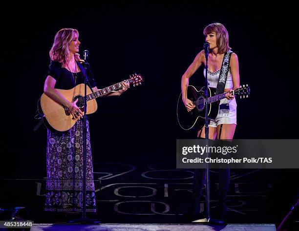 Actress Lisa Kudrow and singer-songwriter Taylor Swift perform onstage during Taylor Swift The 1989 World Tour Live In Los Angeles at Staples Center...