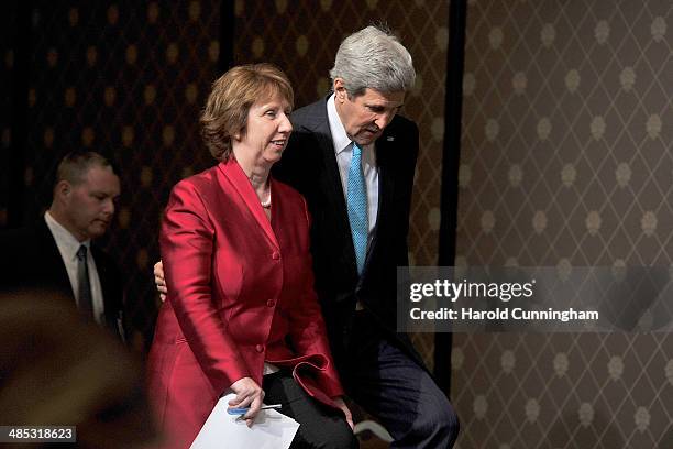 Secretary of State John Kerry and EU Foreign Policy Chief Catherine Ashton arrive to speak during a press conference at the Intercontinental hotel on...