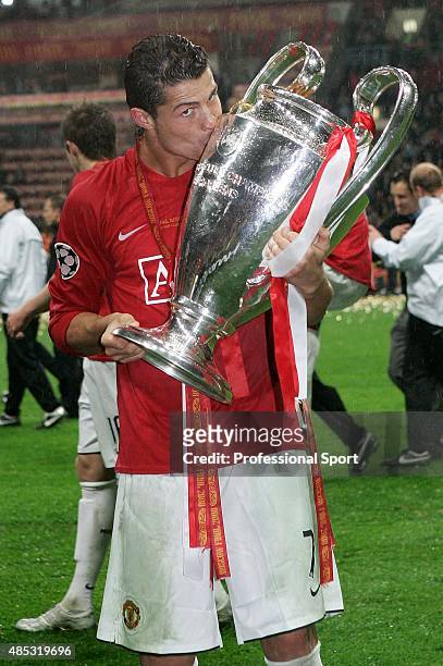 Cristiano Ronaldo of Manchester United kisses the trophy following his team's victory during the UEFA Champions League Final match between Manchester...