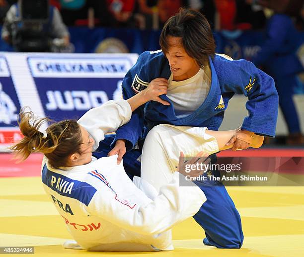 Kaori Matsumoto of Japan and Automne Pavia of France compete in the Women's -57kg Semi Final during the 2015 Astana World Judo Championships at Ice...