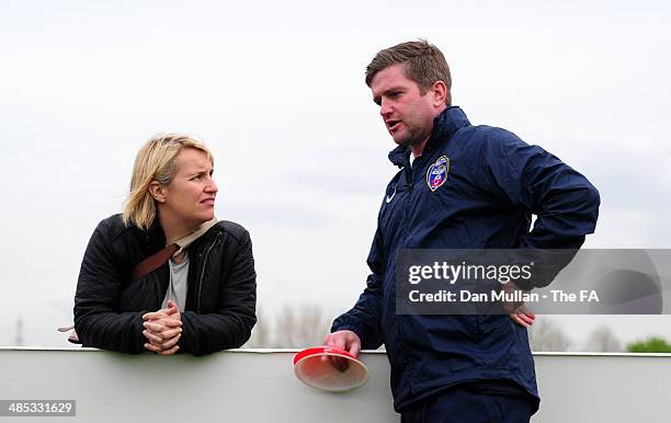 Emma Hayes, manager of Chelsea talks with Dave Edmondson, manager of Bristol ahead of the FA SWL 1 match between Bristol Academy Womens FC and...