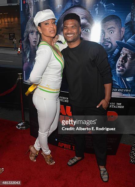 Actress LisaRaye McCoy and actor Damien Dante Wayans arrive to the premiere of Open Road Films' "A Haunted House 2" at Regal Cinemas L.A. Live on...