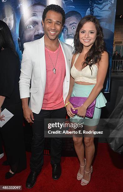 Actors Corbin Bleu and Sasha Clements arrive to the premiere of Open Road Films' "A Haunted House 2" at Regal Cinemas L.A. Live on April 16, 2014 in...
