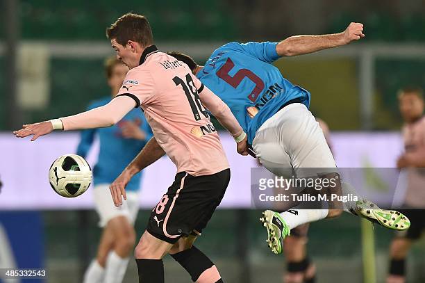 Kyle Lafferty of Palermo and Fabio Lucioni of Reggina battle for the ball during the Serie B match between US Citta di Palermo and Reggina Calcio at...