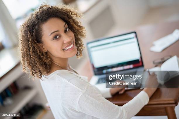 young woman studying at home - woman portrait in home laptop stock pictures, royalty-free photos & images