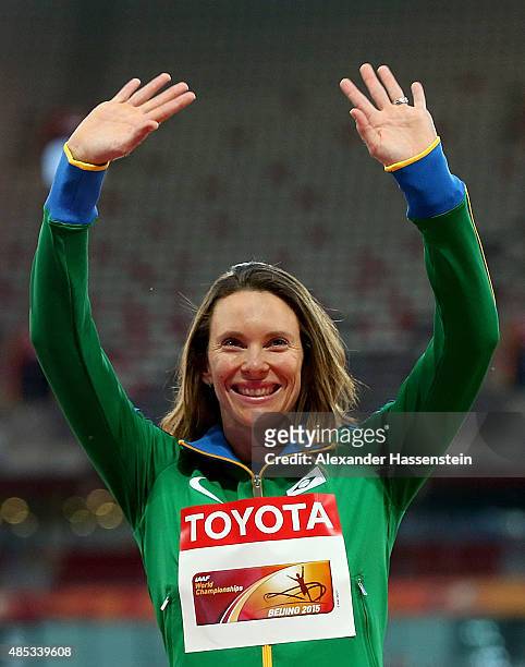 Silver medalist Fabiana Murer of Brazil poses on the podium during the medal ceremony for the Women's Pole Vault final uring day six of the 15th IAAF...