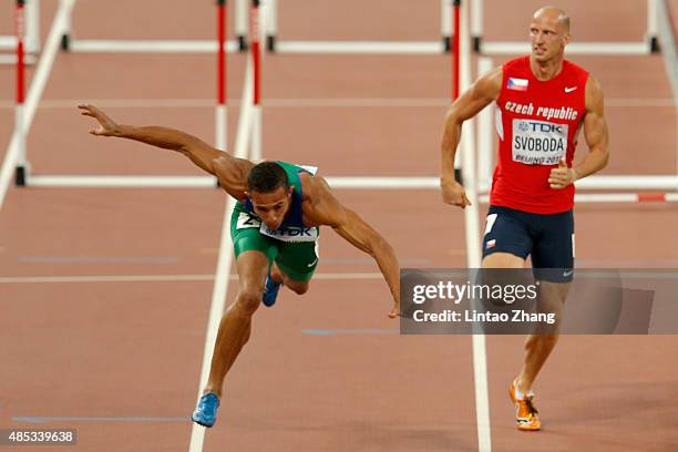 Joao Vitor De Oliveira of Brazil falls in the Men's 110 metres hurdles semi-final during day six of the 15th IAAF World Athletics Championships...