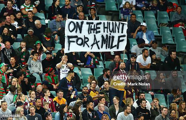 Broncos hold up a banner in support of Ben Hunt and Anthony Milford of the Broncos during the round 25 NRL match between the South Sydney Rabbitohs...
