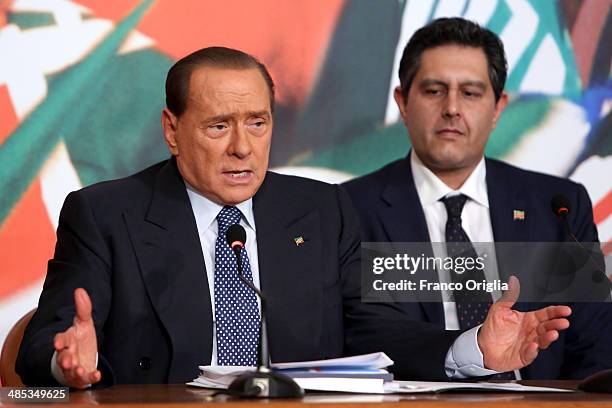 Former Italian Prime Minister Silvio Berlusconi, flanked by his new advisor Giovanni Toti , holds a press conference to open the European electoral...