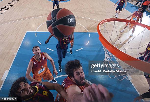 Victor Sada, #8 of FC Barcelona competes with Furkan Aldemir, #19 of Galatasaray Liv Hospital Istanbul during the Turkish Airlines Euroleague...