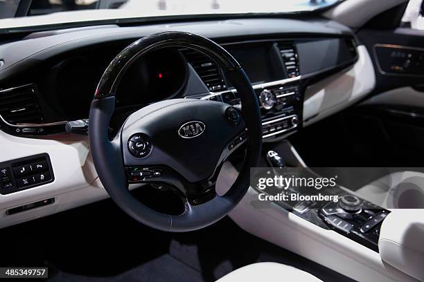 The streering wheel of a Kia Motors Corp. 2015 k900 vehicle is seen during the 2014 New York International Auto Show in New York, U.S., on Thursday,...