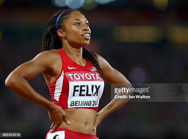 Allyson Felix of the United States celebrates after winning gold in the Women's 400 metres Final during day six of the 15th IAAF World Athletics...