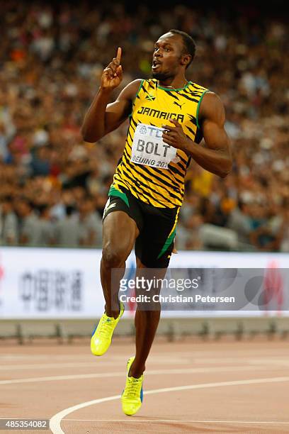 Usain Bolt of Jamaica crosses the finish line to win gold in the Men's 200 metres final during day six of the 15th IAAF World Athletics Championships...