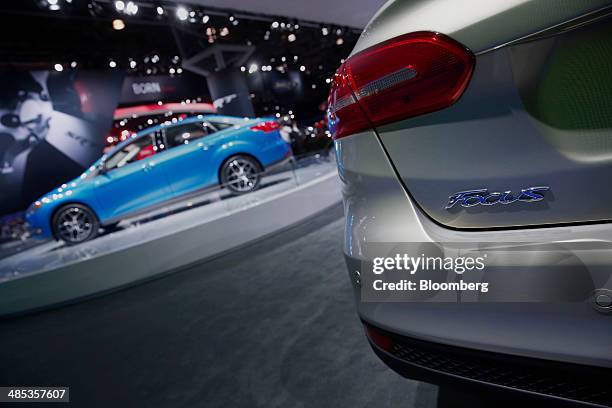 The Ford Motor Co. 2015 Focus vehicles are displayed during the 2014 New York International Auto Show in New York, U.S., on Thursday, April 17, 2014....