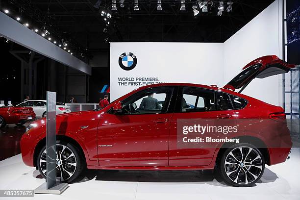 The Bayerische Motoren Werke AG 2015 X4 vehicle is displayed during the 2014 New York International Auto Show in New York, U.S., on Thursday, April...