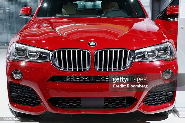 The Bayerische Motoren Werke AG 2015 X4 vehicle is displayed during the 2014 New York International Auto Show in New York, U.S., on Thursday, April...