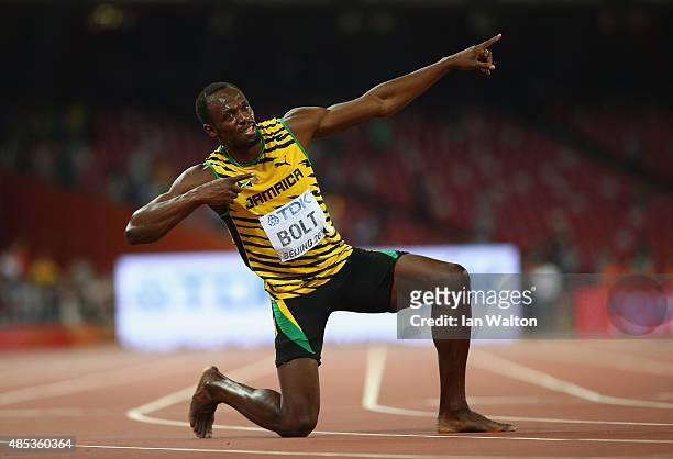 Usain Bolt of Jamaica celebrates after winning gold in the Men's 200 metres final during day six of the 15th IAAF World Athletics Championships...