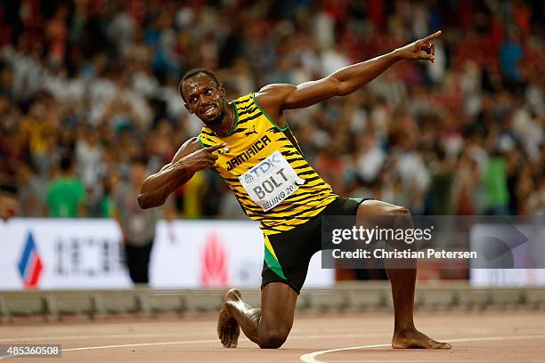 Usain Bolt of Jamaica celebrates after winning gold in the Men's 200 metres final during day six of the 15th IAAF World Athletics Championships...