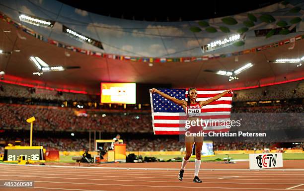 Allyson Felix of the United States celebrates after winning gold in the Women's 400 metres Final during day six of the 15th IAAF World Athletics...