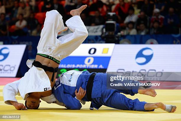 South Koreas Lee Seungsu competes with Canadas Antoine Valois-Fortier during the mens bronze medal match, in the -81kg category at the Judo World...