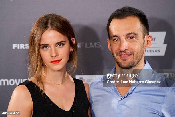 Actress Emma Watson and director Alejandro Amenabar attend the 'Regression' photocall at Villamagna Hotel on August 27, 2015 in Madrid, Spain.