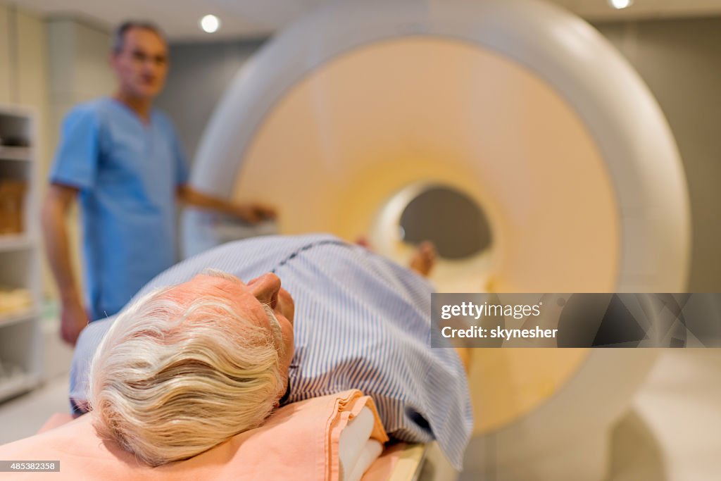 Senior patient about to receive an MRI scan.